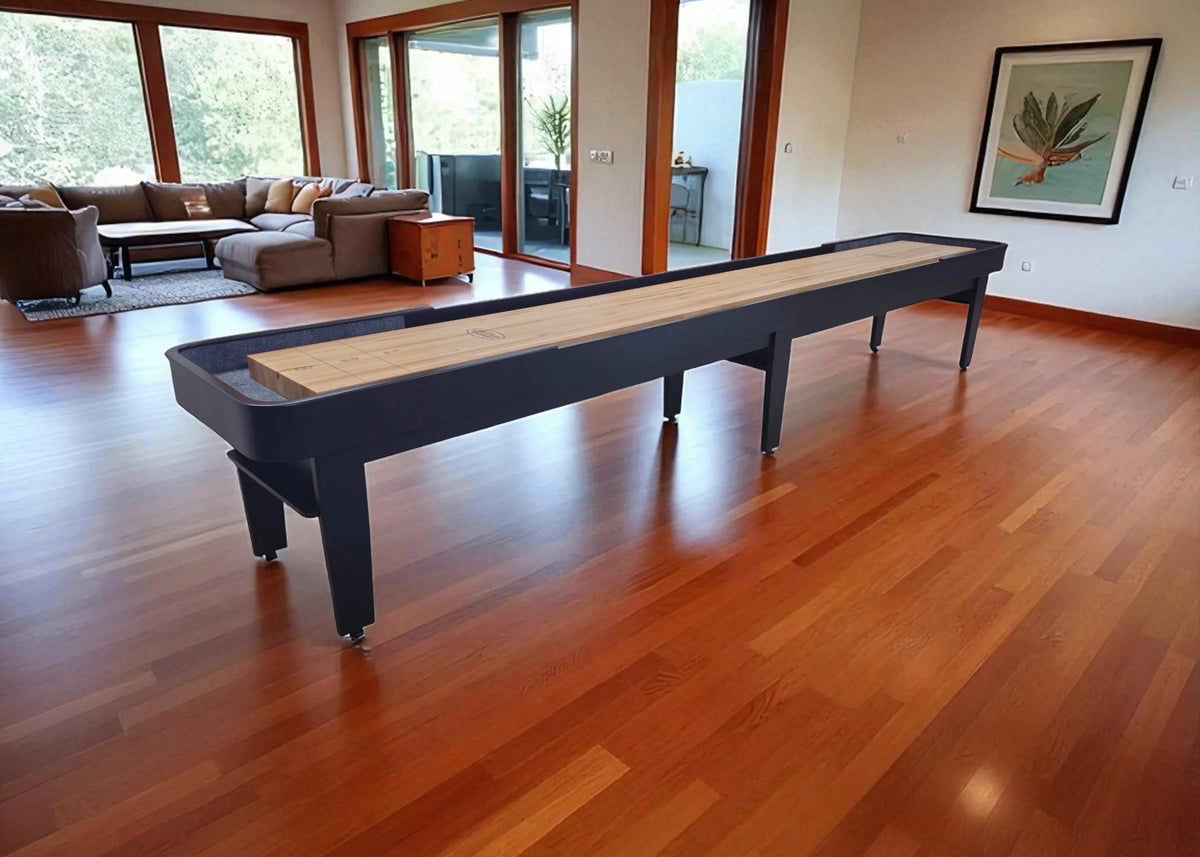 Introducing Our Tournament II Shuffleboard Table set in a modern living room with polished hardwood floors.