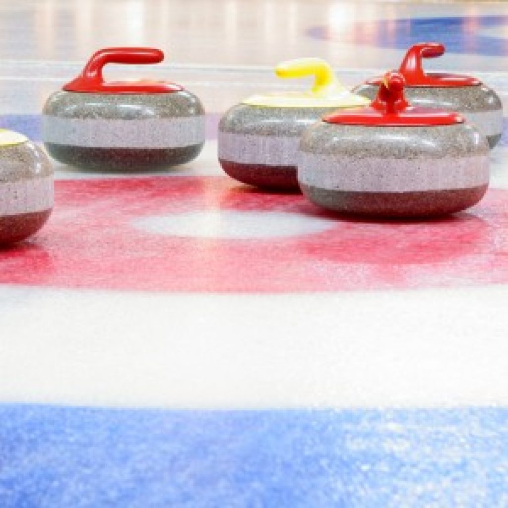 Curling: Table Shuffleboard's Distant Cousin