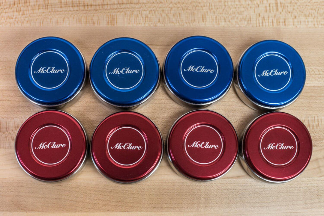 Pro Weights Stainless Steel Pucks with Aluminum Caps - Red/Blue